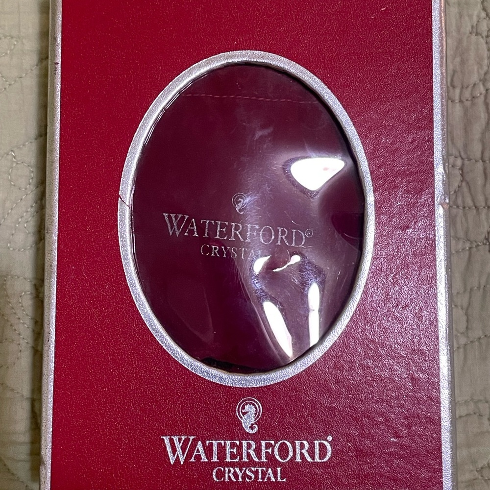 Waterford Crystal Baby’s First Christmas baby bottle with pink and blue hooks